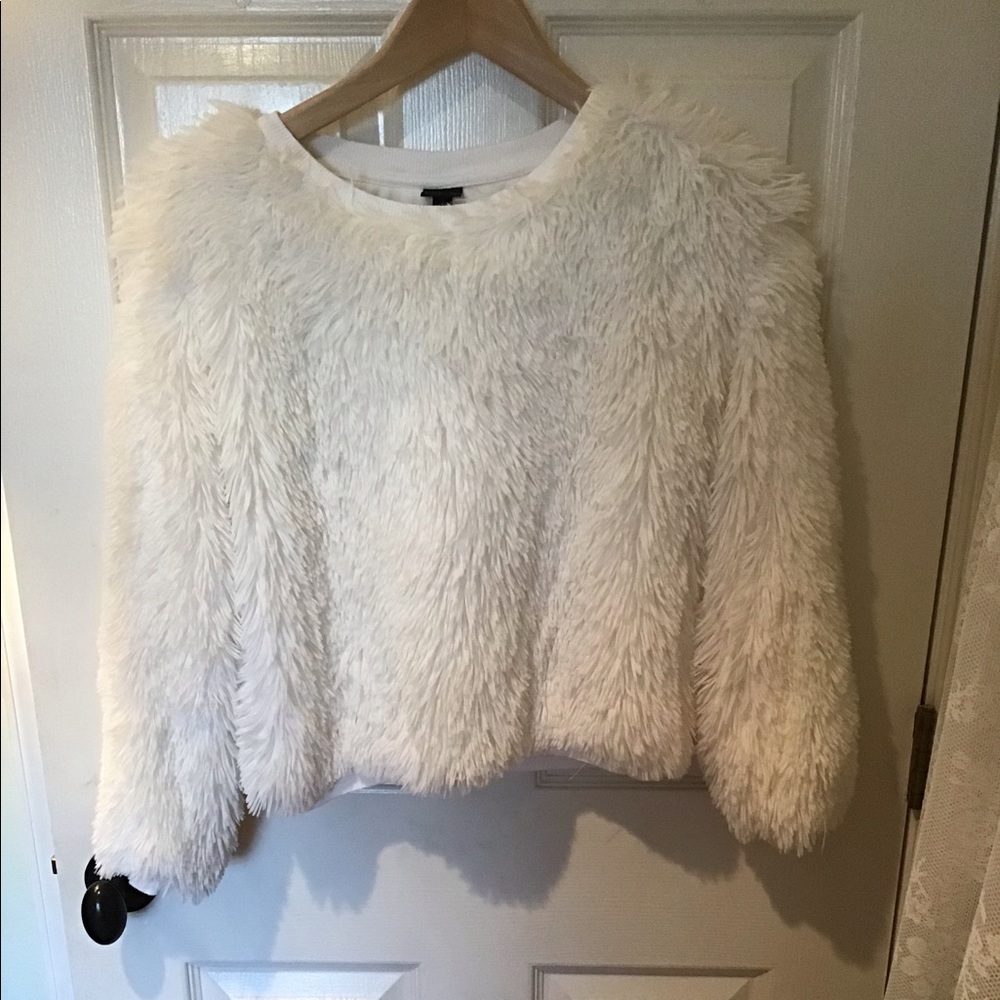 Girl’s fuzzy sweater XL